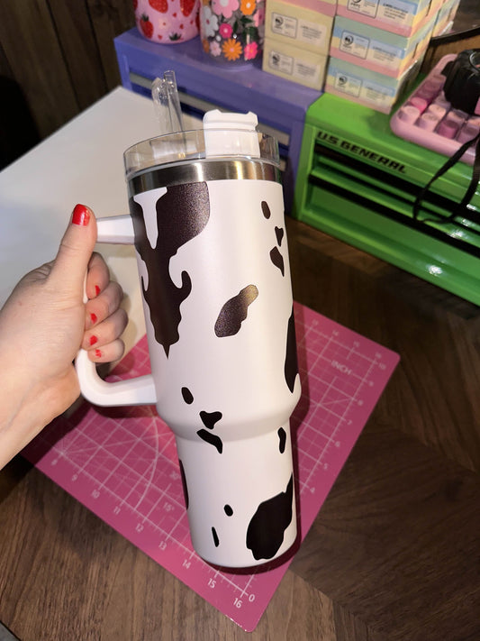 COW PRINT BLACK 40OZ TUMBLER W/ PLASTIC STRAW